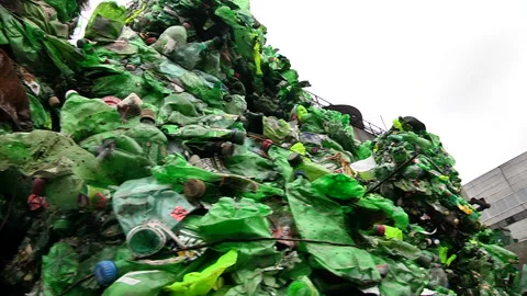 Piles of compressed plastic bottles prepared for recycling Stock Footage 85471163