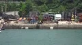 Piles Of Equipment And Junk A Japanese Harbor Naoshime Island HD HD Footage