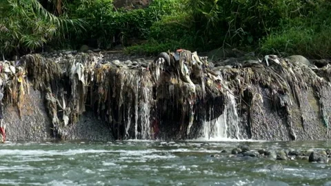 Piles of garbage in mountain rivers Stock Footage 320922334