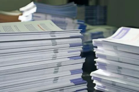 Piles of handout papers Stock Photos