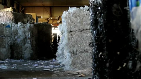 Piles of plastic packaging bottles for recycling waste to be reused as factory Vídeos de archivo 334661627