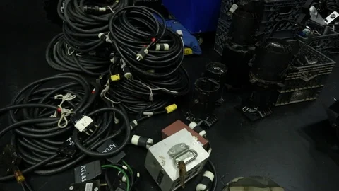 Piles of power cables behind the scenes on movie set 1 Video stock 125491834