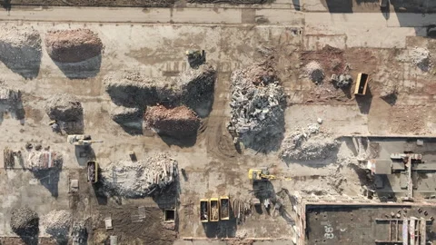 Piles of rubble and containers from old industrial building with excavators. Stock-Footage 301823853
