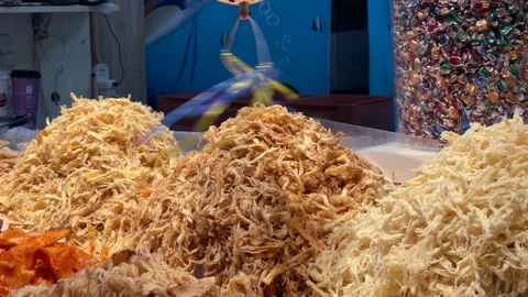 Piles Of Shredded Dried Squid And Fish Floss At A Market Stall Video stock 344232911