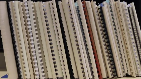 Piles of Temporary Binding documents or report with plastic ring binder. Stock Footage 146687464