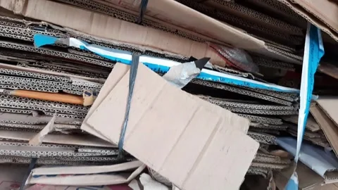 Piles of used cardboard boxes collected for recycling Stock Footage 285913514