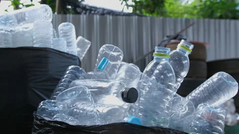 Piles of used plastic drinking water bottles included for recycle Stock Footage 164600400