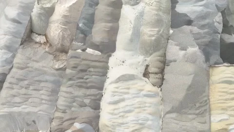 Piles of various colored sand and gravel materials arranged in rows Stock Footage 331380643