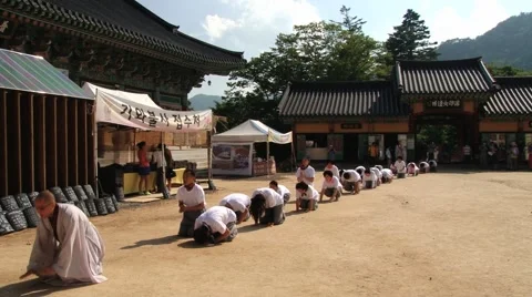 Pilgrims approach Haeinsa Buddhist temple in Haeinsa, Korea. Video stock 62232673