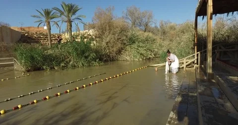 Pilgrims are baptized Stock Footage 77283364