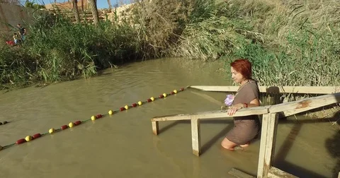 Pilgrims are baptized Stock Footage 77283427