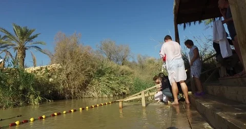 Pilgrims are baptized Stock Footage 77283482