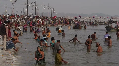 Pilgrims Bathing in the Ganges at Kumbh Mela Festival in Allahabad, India Stock Footage