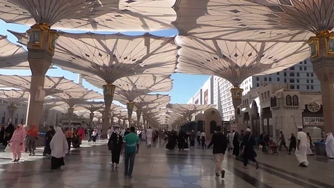 Pilgrims go for prayer, Nabawi mosque Stock Footage