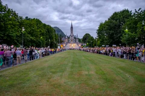 Pilgrims partaking in La Procession Mariale Aux Flambeaux or the Torchlight M Stock Photos