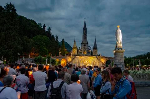 Pilgrims partaking in La Procession Mariale Aux Flambeaux or the Torchlight M Stock Photos