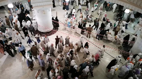 Pilgrims perform Saee or saie during of Hajj and Umra between Safa and Marwa Stock Footage 126087859