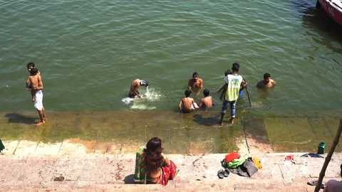 Pilgrims take bath in River Ganges 스톡 동영상 103422113