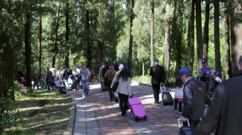 Pilgrims, tourists walk to the monastery Stock Footage 49939411