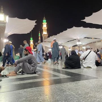 Pilgrims visiting the Prophet's Mosque  Stock Photos