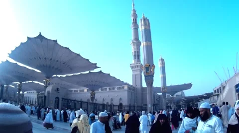 Pilgrims walking at compound of Nabawi Mosque Stock Footage 55277233