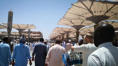 Pilgrims walking to the mosque Stock Footage 119669361