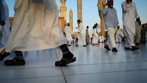 Pilgrims walking to the mosque Stock Footage 119669701