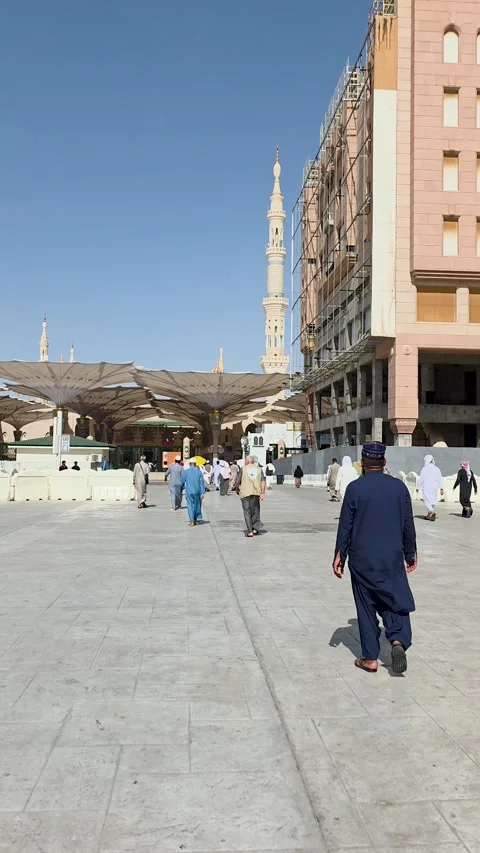 Pilgrims Walking to the Prophets Mosque Stock Footage 346409759