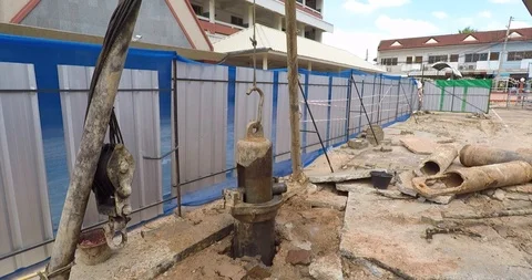 Piling machine sets the pile Construction Stock Footage 91877778