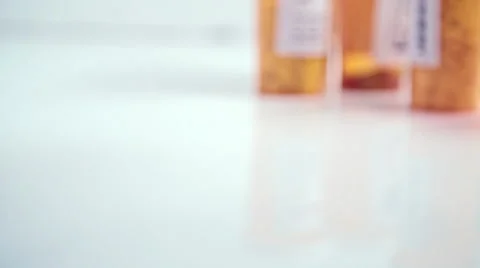 Pill Bottle Falling Down Video stock 56781816