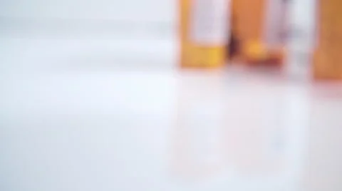 Pill Bottle Falling Down Stock Footage 56782401