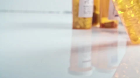 Pill Bottle Falling Down Stock Footage 56782632