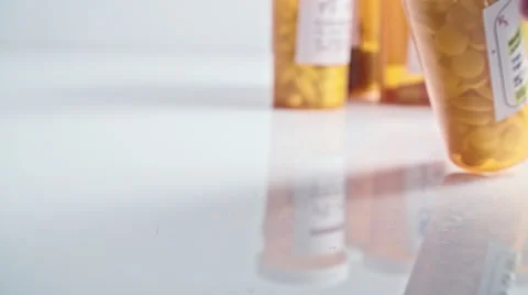 Pill Bottle Falling Down Stock Footage 56782722
