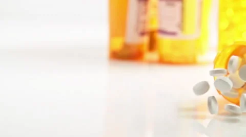 Pill Bottle Falling Down Video stock 56783366