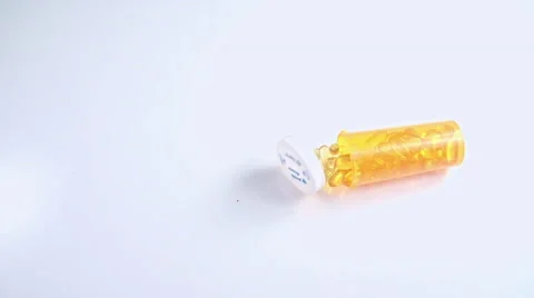 Pill Bottle Falling Down Stock Footage 56906143