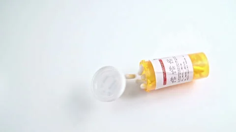 Pill Bottle Falling Down Stock Footage 56908214