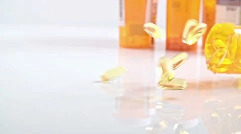 Pill Bottle Falling Down Stock Footage 56908774