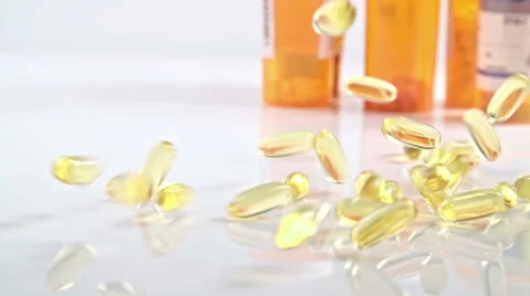 Pill Bottle Falling Down Stock Footage 56909208