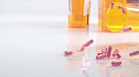 Pill Bottle Falling Down Stock Footage 56909596