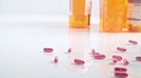 Pill Bottle Falling Down Stock Footage 56909914