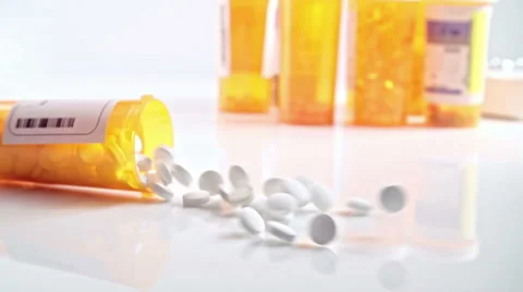 Pill Bottle Falling Down Stock Footage 56909977