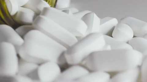 Pill Bottle Overflowing With White Tablets 스톡 동영상 68804790