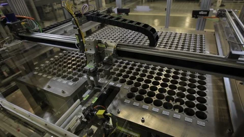 Pill bottles. Sorted automatically into numbered slots A Stock Footage 101706671