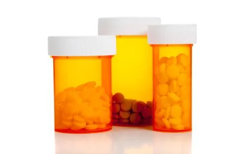 Pill bottles on a white background Stock Photos