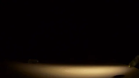 Pill capsule falling and spilling on black surface in slow motion Vídeo Stock 74769144