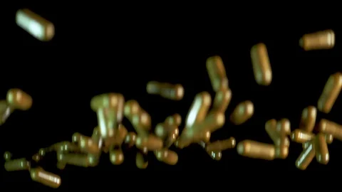 Pill capsules falling on the mirror table. Slowmotion shot, 180 fps Stock Footage 86283649