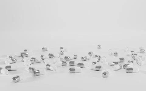Pill capsules on white background, pile white silver medical tablet Illustrazione stock