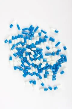 Pill capsules on white Stock Photos