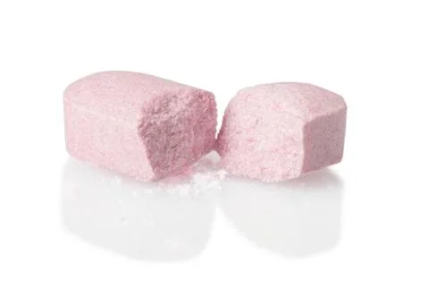 Pill cut in half Stock Photos