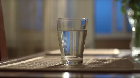 Pill dissolves in water Stock Footage 65968906